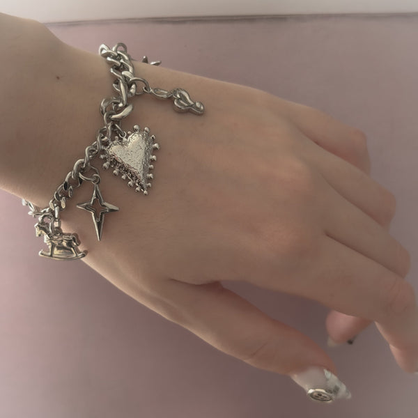“Girlhood” charm bracelet