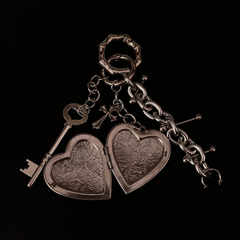 “Reverie” locket bag charm